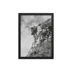 The jagged profile of The Old Man of The Mountain, the New Hampshire state symbol - Franconia, New Hampshire, 1901 framed print on a plain backdrop in size 12"x16".