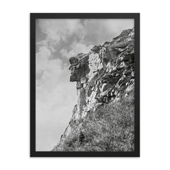 The jagged profile of The Old Man of The Mountain, the New Hampshire state symbol - Franconia, New Hampshire, 1901 framed print on a plain backdrop in size 18"x24".