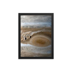 The moons Io and Europe passing by Jupiter, captured by Cassini framed print on a plain backdrop in size 12"x16".