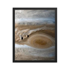 The moons Io and Europe passing by Jupiter, captured by Cassini framed print on a plain backdrop in size 16"x20".