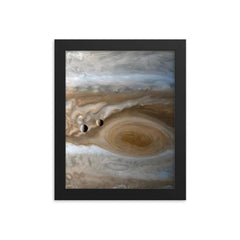 The moons Io and Europe passing by Jupiter, captured by Cassini framed print on a plain backdrop in size 8"x10".
