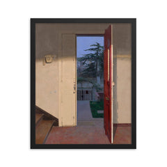 The Red Door by Isabel Quintanilla, 1978 framed print on a plain backdrop in size 16"x20".
