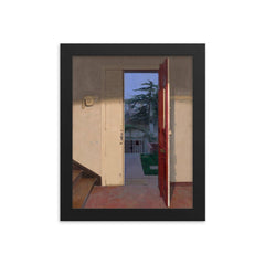 The Red Door by Isabel Quintanilla, 1978 framed print on a plain backdrop in size 8"x10".