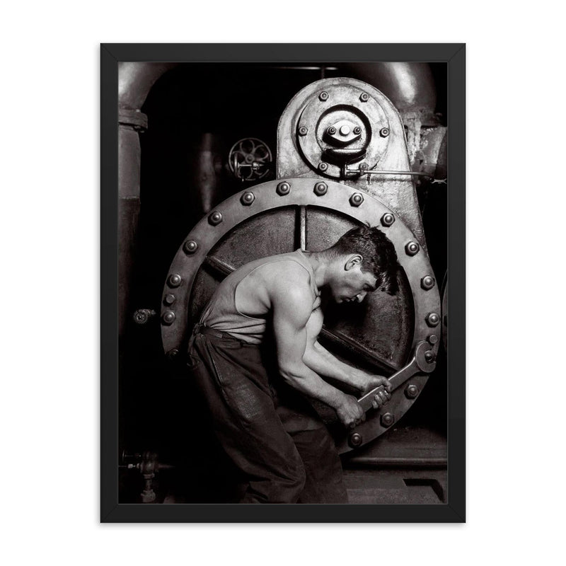 The Steamfitter, 1921 - Lewis Hines' iconic black and white photo of a power plant mechanic posed in front of a steam generator framed print on a plain backdrop in size 18