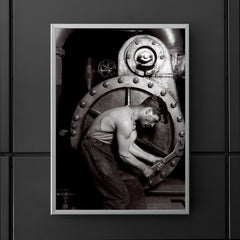 The Steamfitter, 1921 - Lewis Hines' iconic black and white photo of a power plant mechanic posed in front of a steam generator poster 5