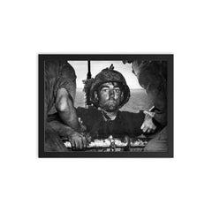 The Thousand Yard Stare - US Marine Theodore J  Miller, 1944 framed print on a plain backdrop in size 12"x16".
