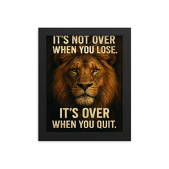 The words 'It's not over when you lose It's over when you quit ' with the face of a majestic looking lion inspirational art framed print on a plain backdrop in size 8"x10".