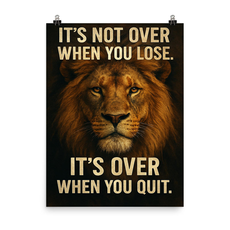The words 'It's not over when you lose It's over when you quit ' with the face of a majestic looking lion inspirational art poster on a plain backdrop in size 8