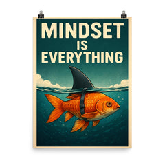 The words 'Mindset is everything' with an image of a goldfish with a shark fin strapped to its back so from above the water it looks like a shark but below the water you can see it's a goldfish poster on a plain backdrop in size 8"x10".