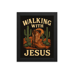 The words 'Walking with Jesus' with a cowgirl aesthetic inspired design of desert cacti and cowgirl boots framed print on a plain backdrop in size 8"x10".