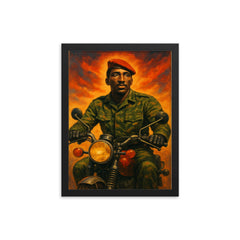 Thomas Sankara on motorcycle in fatigues framed print on a plain backdrop in size 12"x16".