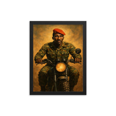 Thomas Sankara on motorcycle with red beret framed print on a plain backdrop in size 12"x16".