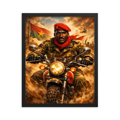 Thomas Sankara on motorcycle with red beret framed print on a plain backdrop in size 16"x20".