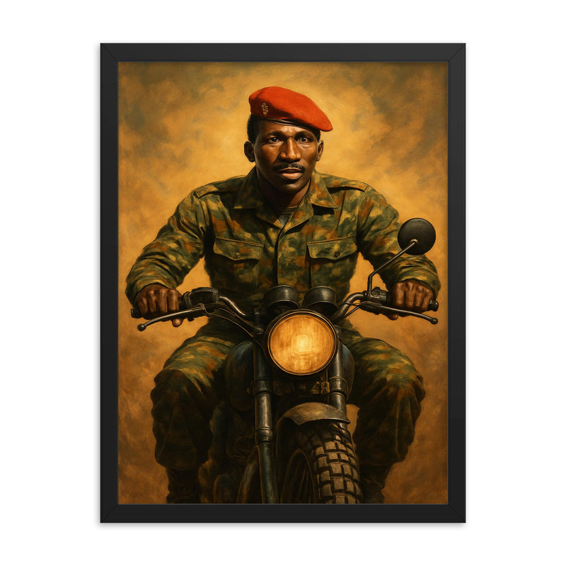 Thomas Sankara on motorcycle with red beret framed print on a plain backdrop in size 18