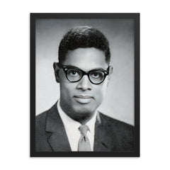 Thomas Sowell framed print on a plain backdrop in size 18"x24".