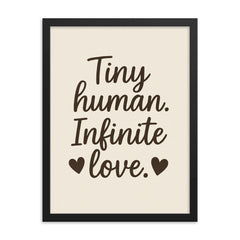 Tiny human Infinite love framed print on a plain backdrop in size 18"x24".