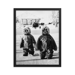 Twins Toddlers Dressed for Cold on a Russian Street, 1968 framed print on a plain backdrop in size 16"x20".