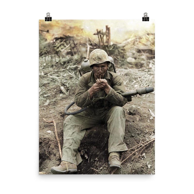 US Marine with M2-2 Flamethrower Lighting a Pipe, Iwo Jima in Background poster on a plain backdrop in size 8