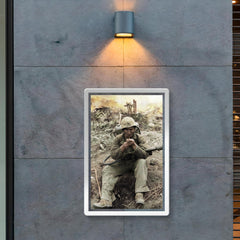 US Marine with M2-2 Flamethrower Lighting a Pipe, Iwo Jima in Background poster 2