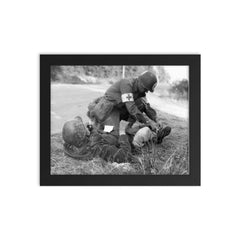 US Medic Providing First Aid to Wounded German Soldier, France 1944 framed print on a plain backdrop in size 8"x10".