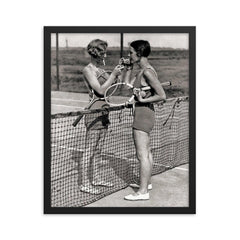 Vintage tennis photo - women tennis players smoking framed print on a plain backdrop in size 16"x20".