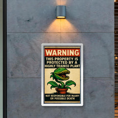 WARNING This property is protected by a highly trained plant poster 2