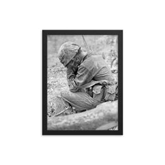 Weary Marine Weeping Amid Rubble After Battle for Hill 200, August 1944 framed print on a plain backdrop in size 12"x16".