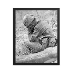 Weary Marine Weeping Amid Rubble After Battle for Hill 200, August 1944 framed print on a plain backdrop in size 16"x20".