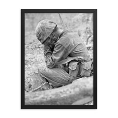 Weary Marine Weeping Amid Rubble After Battle for Hill 200, August 1944 framed print on a plain backdrop in size 18"x24".