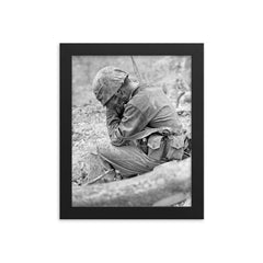 Weary Marine Weeping Amid Rubble After Battle for Hill 200, August 1944 framed print on a plain backdrop in size 8"x10".