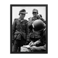 Yang Kyoungjong: A Soldier Captured by Three Armies, Normandy, June 1944 framed print on a plain backdrop in size 18"x24".