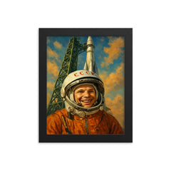 Yuri Gagarin smiling beneath Vostok launch gantry framed print on a plain backdrop in size 8"x10".