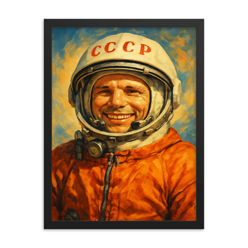 Yuri Gagarin smiling in cosmonaut orange framed print on a plain backdrop in size 18