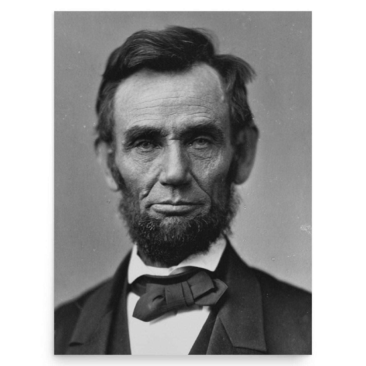 A rectangular Abraham Lincoln poster print on a plain backdrop.