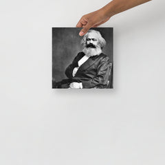 A Karl Marx poster on a plain backdrop in size 10x10”.
