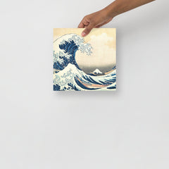 The Great Wave off Kanagawa by Hokusai poster on a plain backdrop in size 10x10”.