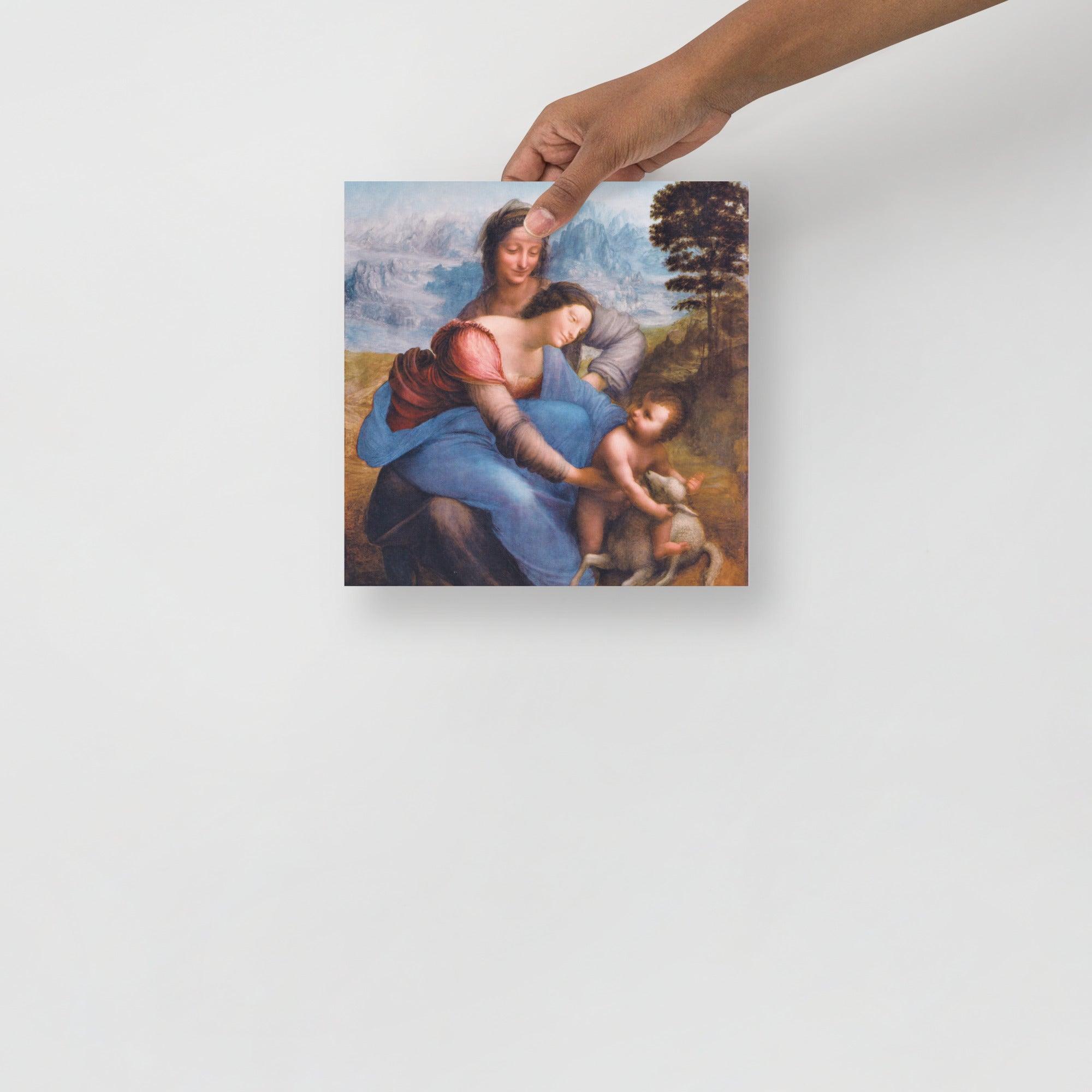 The Virgin and Child with Saint Anne by Leonardo da Vinci poster on a plain backdrop in size 10x10”.