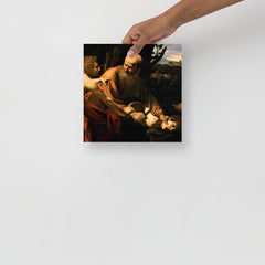 A Sacrifice of Isaac by Caravaggio poster on a plain backdrop in size 10x10”.