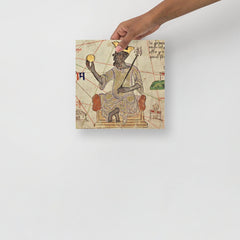 A Mansa Musa poster on a plain backdrop in size 10x10”.