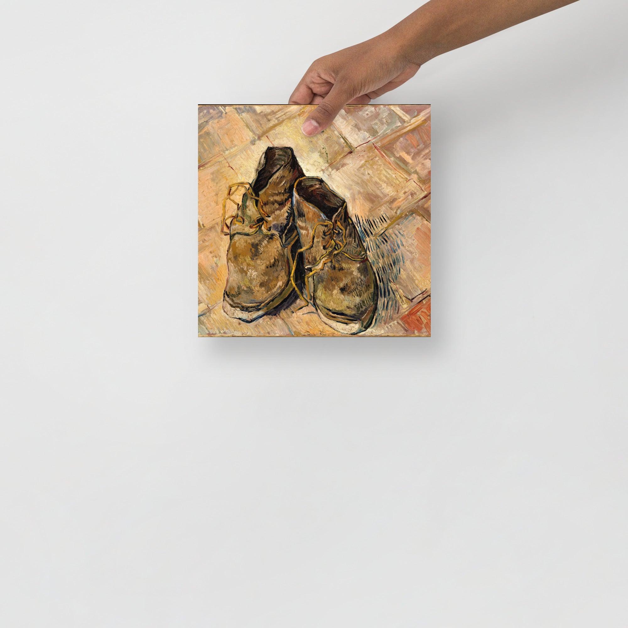 A Shoes by Vincent Van Gogh poster on a plain backdrop in size 10x10”.