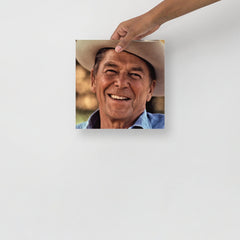 A Ronald Reagan Cowboy Hat poster on a plain backdrop in size 10x10”.