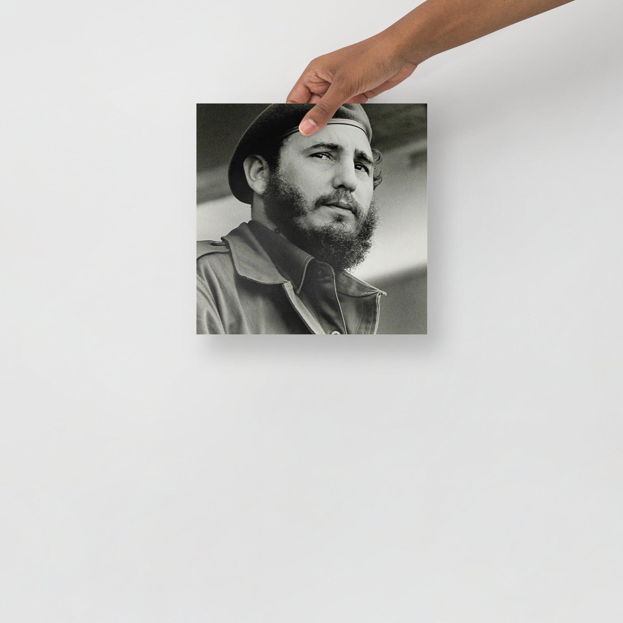 A Fidel Castro poster on a plain backdrop in size 10x10”.