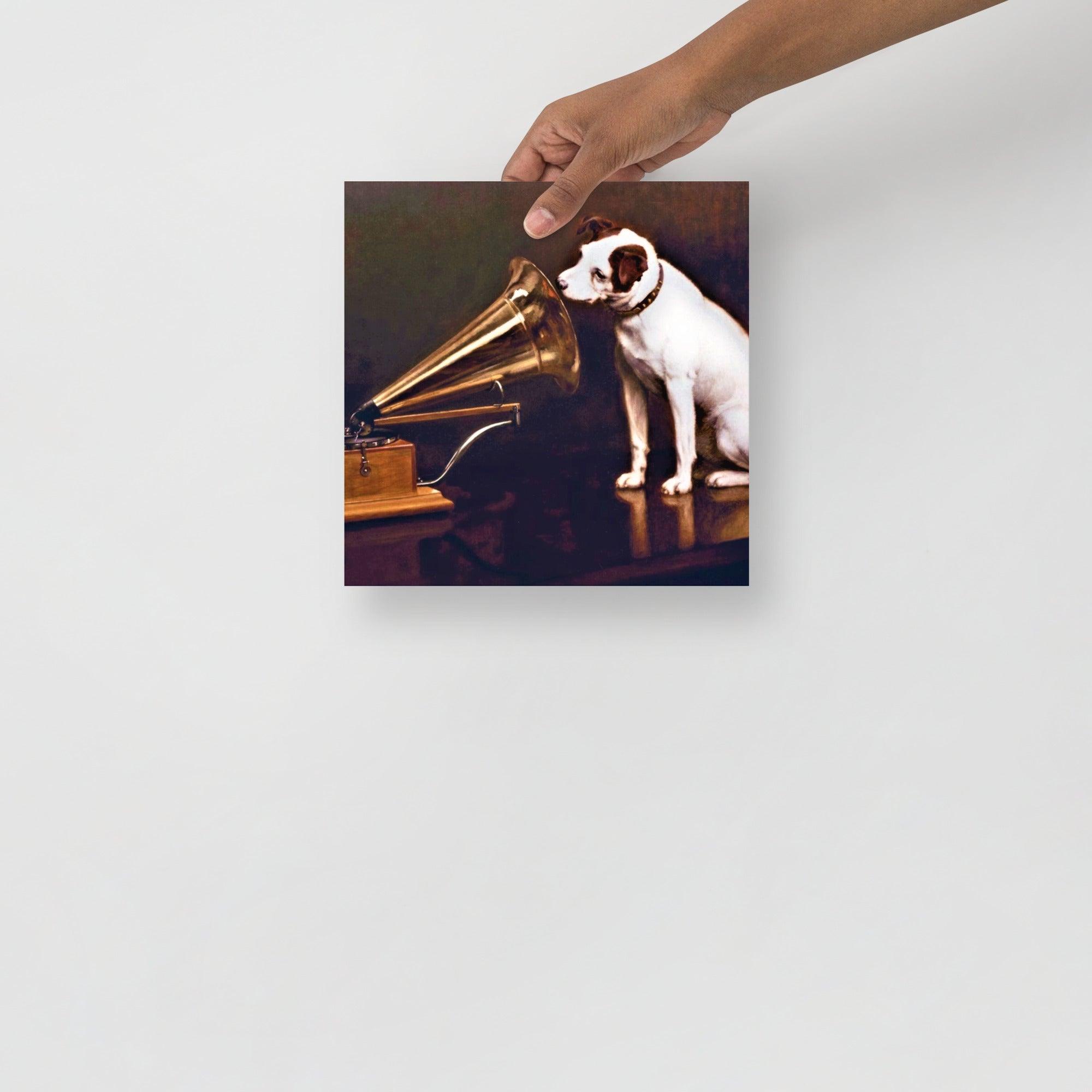 A His Master's Voice By Francis Barraud poster on a plain backdrop in size 10x10”.