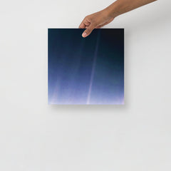 A Pale Blue Dot poster on a plain backdrop in size 12x12”.