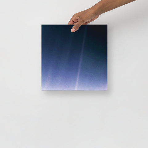 A Pale Blue Dot poster on a plain backdrop in size 12x12”.