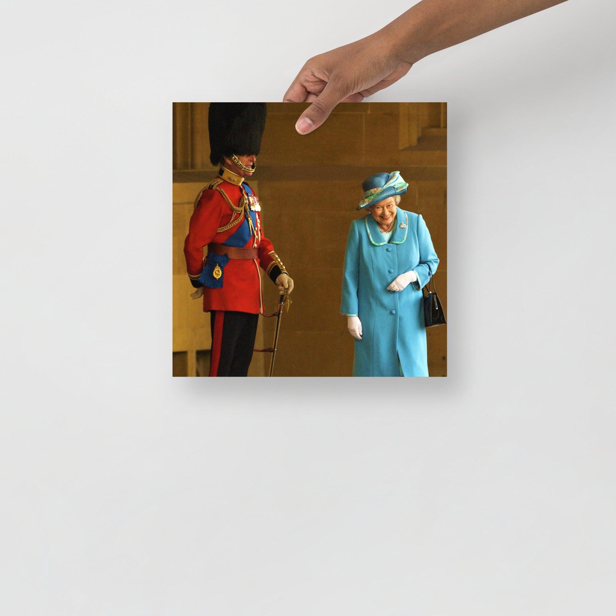 A Queen Elizabeth II with Prince Philip poster on a plain backdrop in size 12x12”.