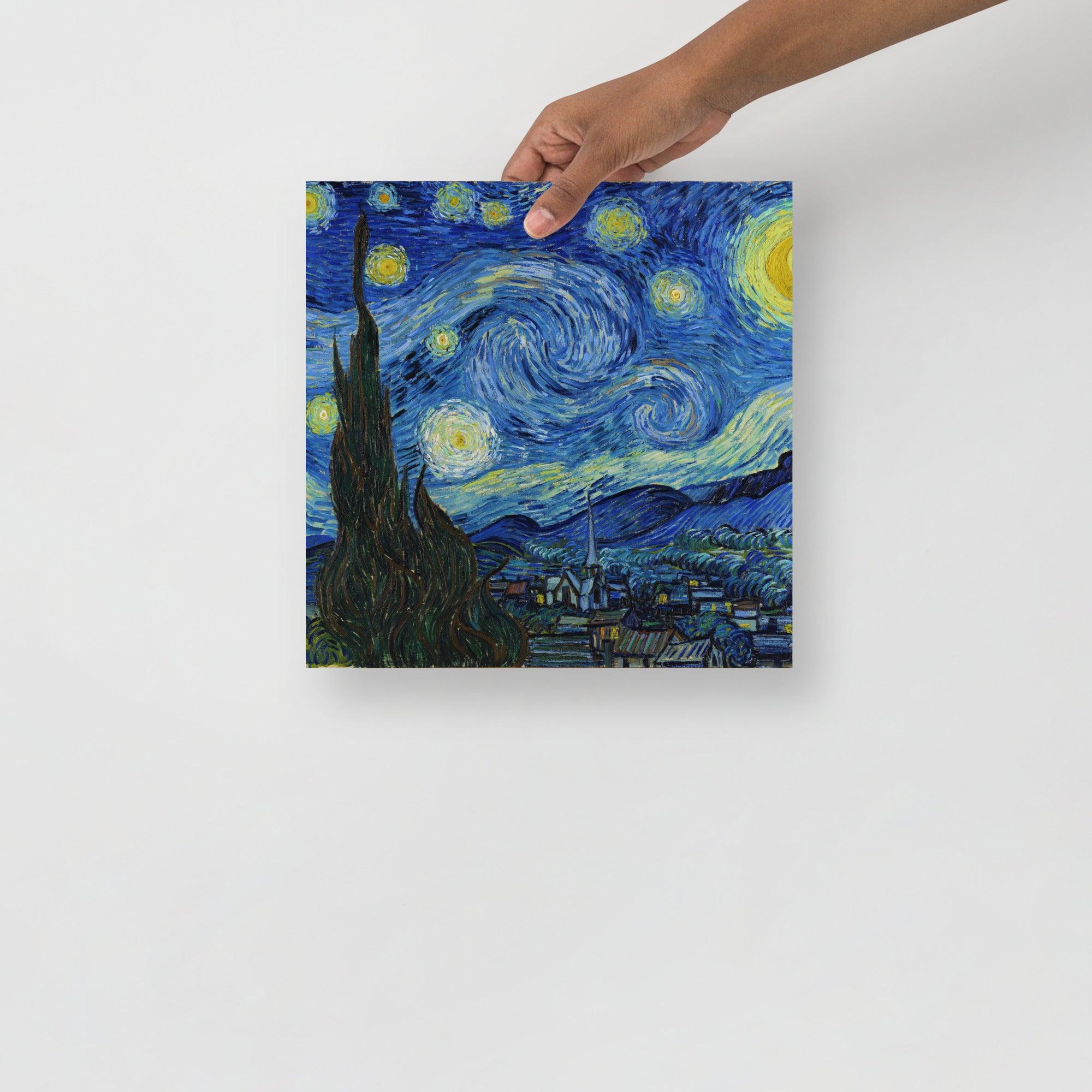 A The Starry Night by Vincent van Gogh poster on a plain backdrop in size 12x12”.