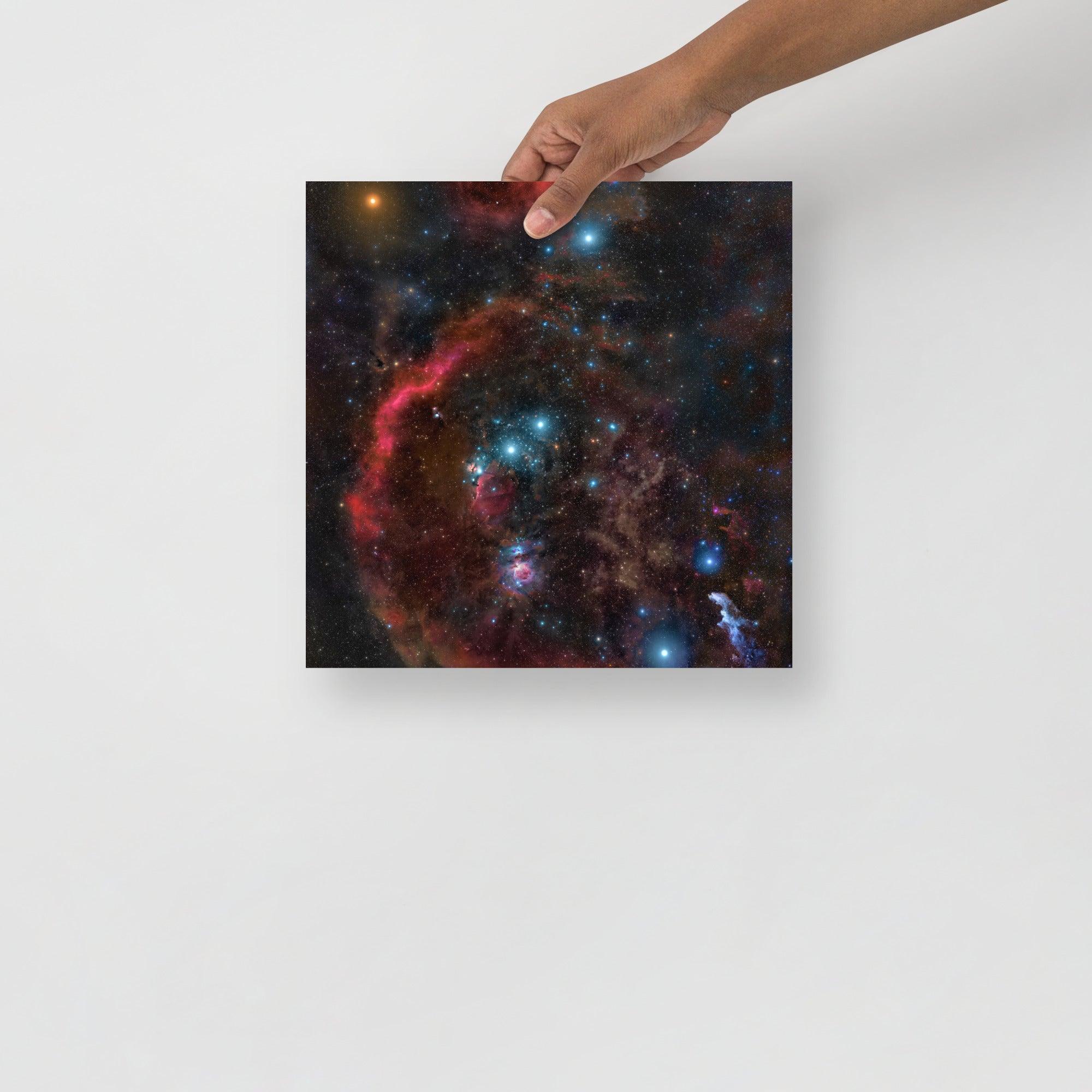 An Orion Constellation poster on a plain backdrop in size 12x12”.