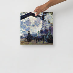 The Gare St-Lazare by Claude Monet  poster on a plain backdrop in size 12x12”.