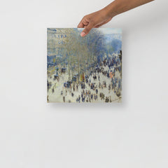 A Boulevard des Capucines by Claude Monet poster on a plain backdrop in size 12x12”.